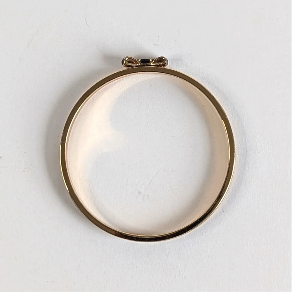 kate spade Black and Gold Enamel Bow Bangle Bracelet